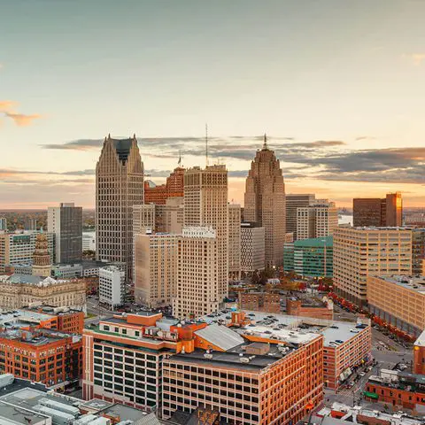 A view of the city skyline at sunset.